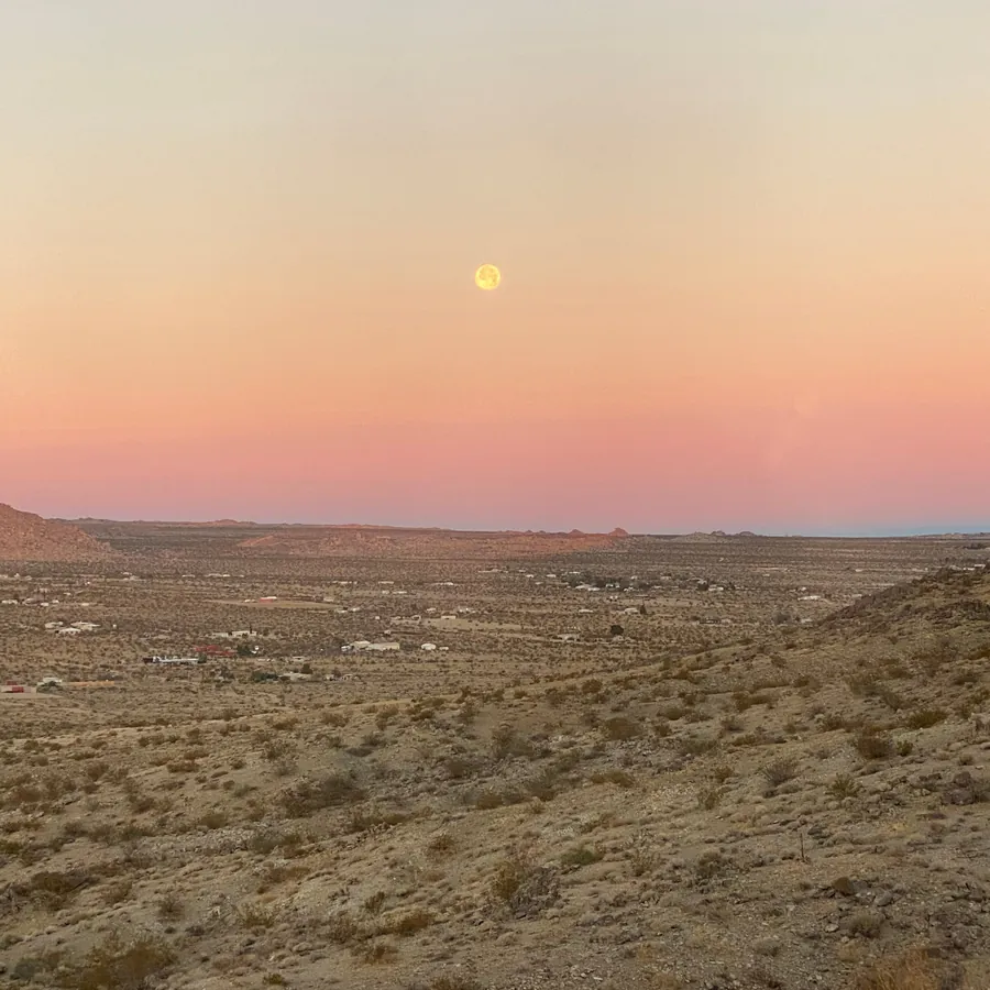 Full moon rising over the desert at Moon Rock Ranch